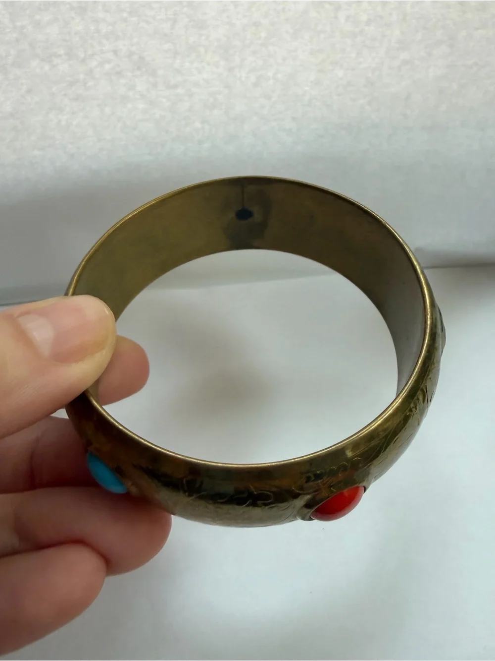 Vintage-Inspired Brass Bangle with Red, black, and Turquoise Cabochons